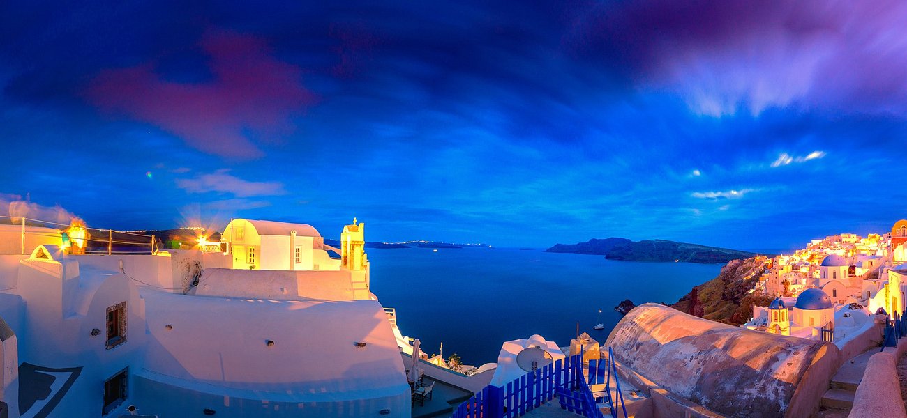 Explore Fira: Life on the edge of a dizzying caldera, high above the ...